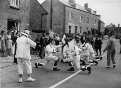 1965.5.1.219 Bampton morris dancers, Oxfordshire. Photograph Topical Press Agency, donated by Ettlinger