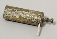 English heet brass cylindrical match box bequeathed by Balfour 1938.35.827