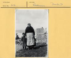 1965.5.1.114 [Front] Woman and grandson Aran Islands, Ireland photographed by Thomas H. Mason