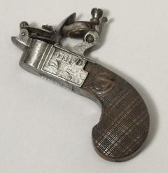 English pocket pistol tinder-box bequeathed by Balfour 1938.35.1101