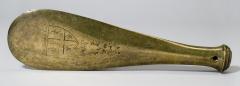 1932.86.1 Reproduction in brass of a Maori cleaver made for Joseph Banks cast by Eleanor Giles